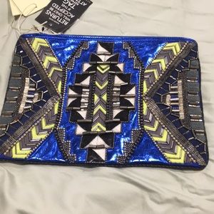 NWT foil blue clutch